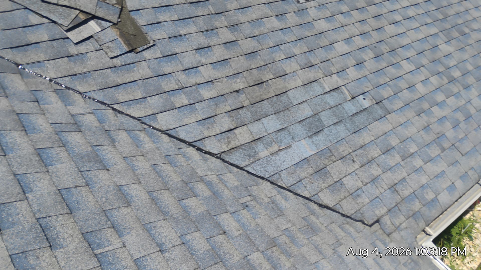 Before image of partially damaged roof in middletown de