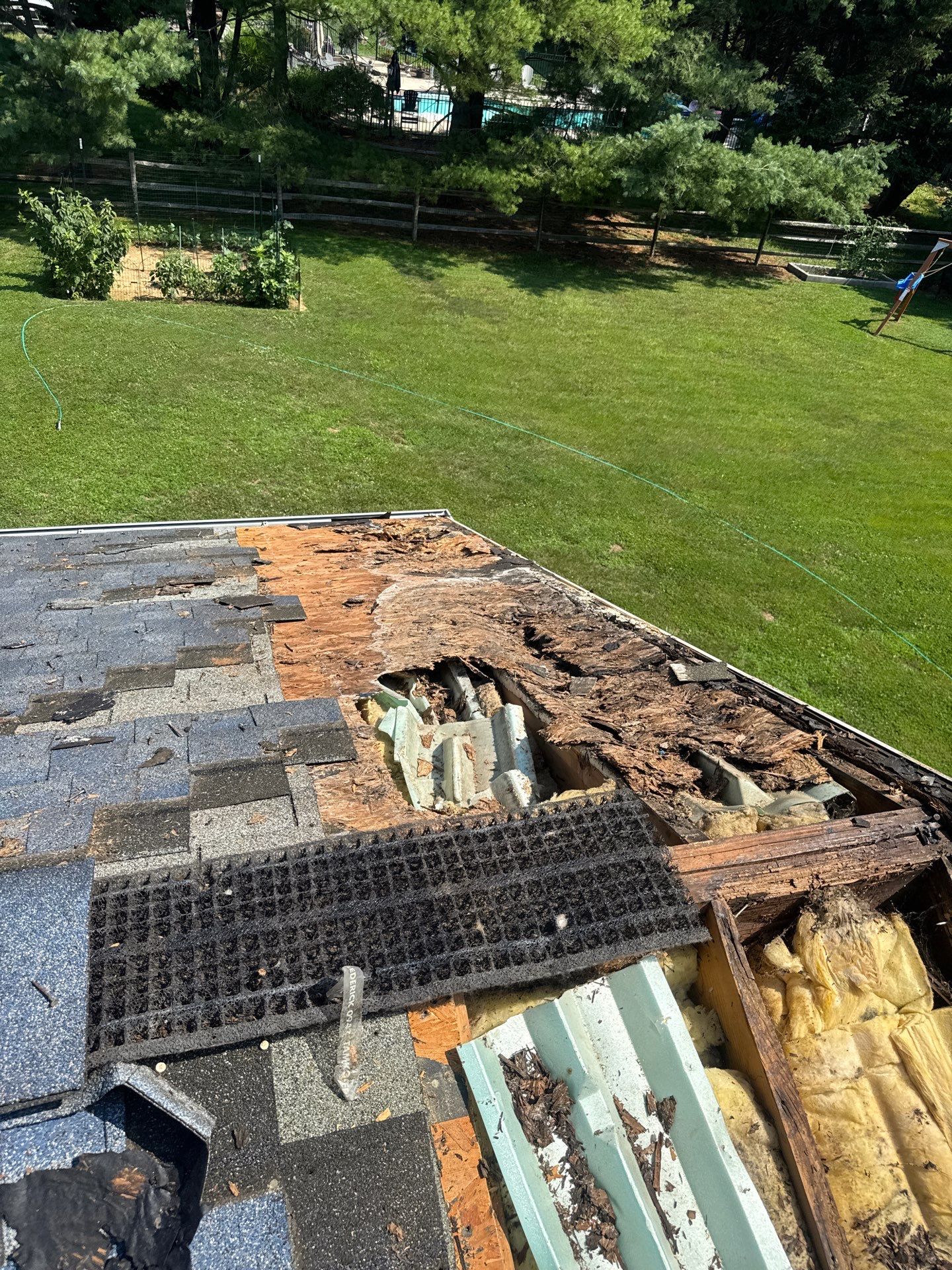 Shingle removal and inspection of rotted wood roof deck on Milford Dr in Middletown DE