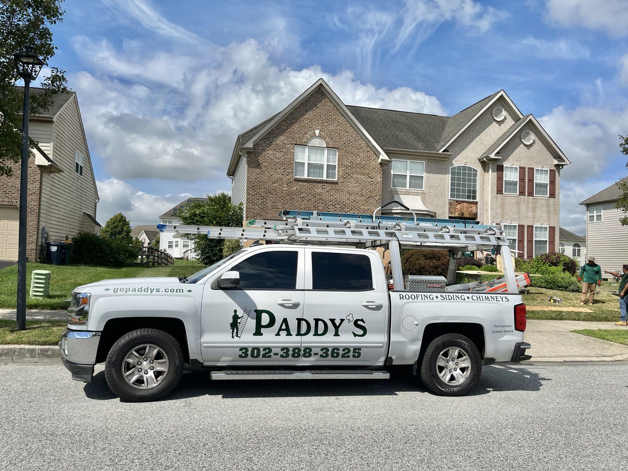 Paddys Chevrolet work truck at job site on Lynn St